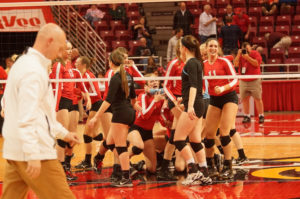 Marian Central senior Norah Cetera, playing in her final volleyball match as a Lady ’Cane, cries after pounding down the match-winning kill at the IHSA Class 3A State Championships. | Independent photo by Dan Chamness