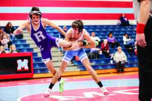 Marian wrestlers dominate the mats