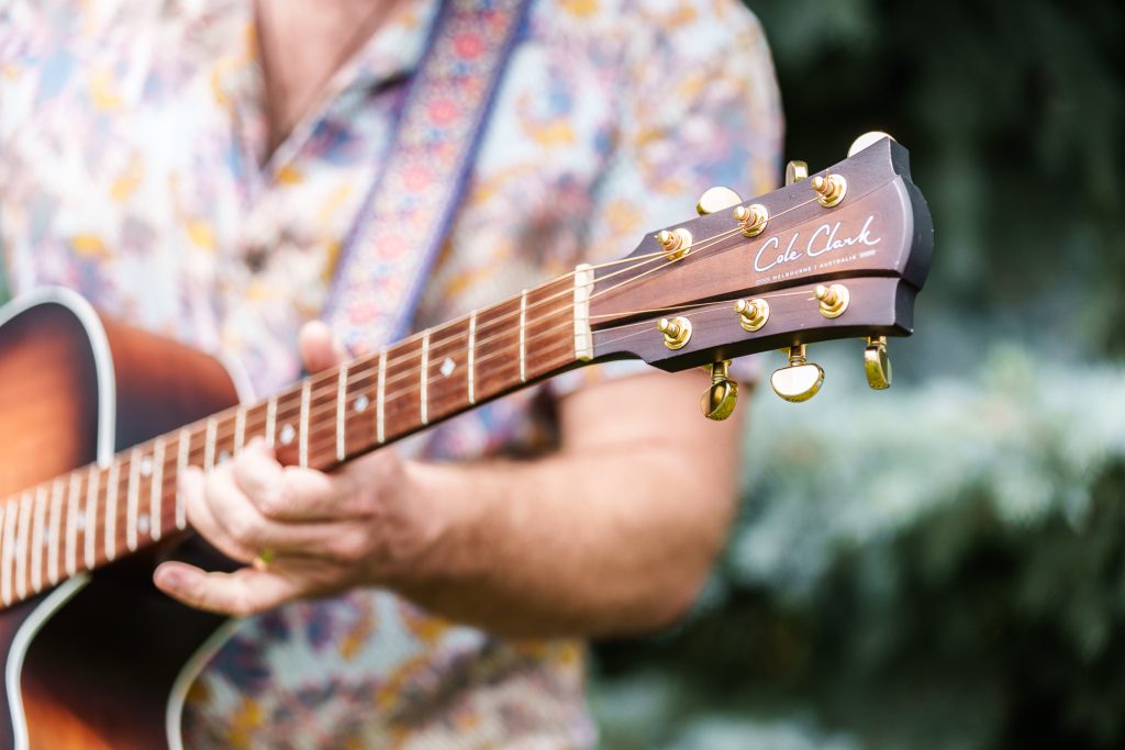 nick stone with guitar