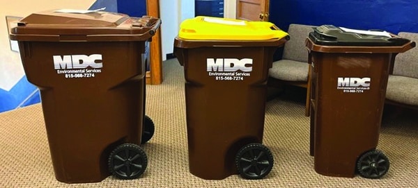 Courtesy photo.
Woodstock went to a mandatory toter garbage collection system starting July 1, using 95-ga;;pm garbage toters, 65-gallon recycling toters, and an option for a smaller 35-gallon garbage toter.