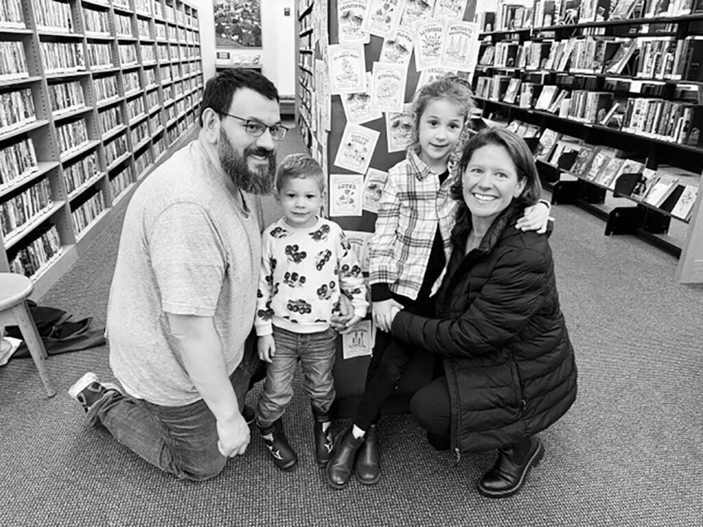 Independent photoby Caryl Dierkson.
The Quintanilla family of Cary poses for a photo while visiting the Woodstock Public Library during the Library Lovers Expedition.