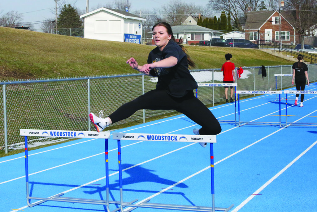 Courtesy photo by Cali Dankemeyer.
Blue Streak sophomore Lydia Weidner works on hurdles at practice.