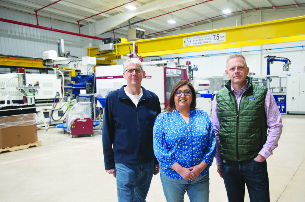 Independent photo by Tricia Carzoli.
(From left) Roland Kuehtreiber, plant director; Olga Ortiz, HR manager; and Andy Ahonen, AFA’s executive vice president of the Americas, stand in AFA Dispensing’s factory at 610 E. Judd St. When fully operational next year, the facility will employ 75 people and manufacture two of the four types of sprayers that the company makes.