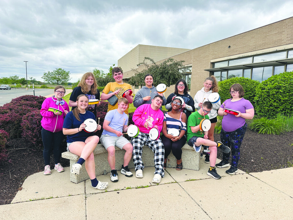 District 200 photo.
Members of Thunder Choir hold their new instruments.