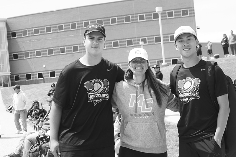 Independent photo by Steve Peterson.
Marian Central's doubles team of Alek Jasovic (left) and Marc Cheng qualified for the IHSA state tennis meet. Pictured in center, coach Gina Jasovic.